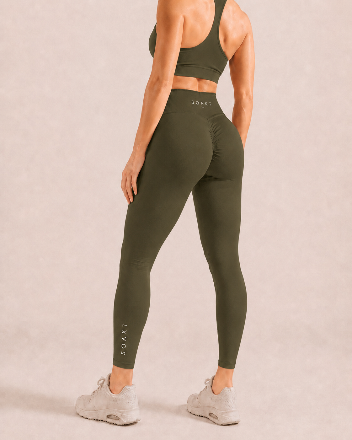 SOAKT Sculpt Legging Core in Forest Moss with high-rise waistband and subtle scrunch detailing